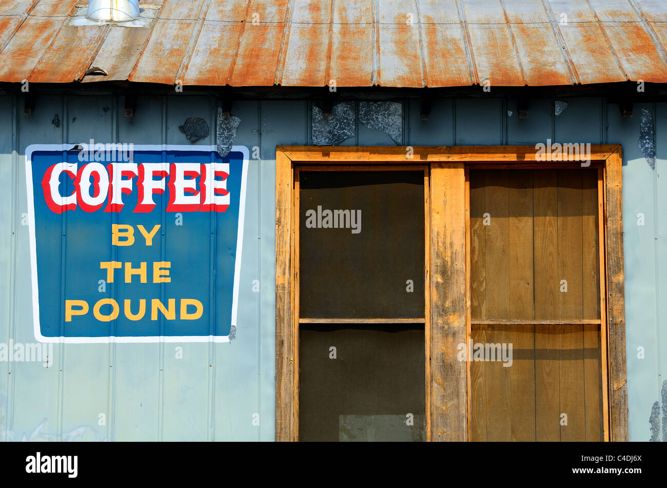 Old coffee shop with sign Stock Photo