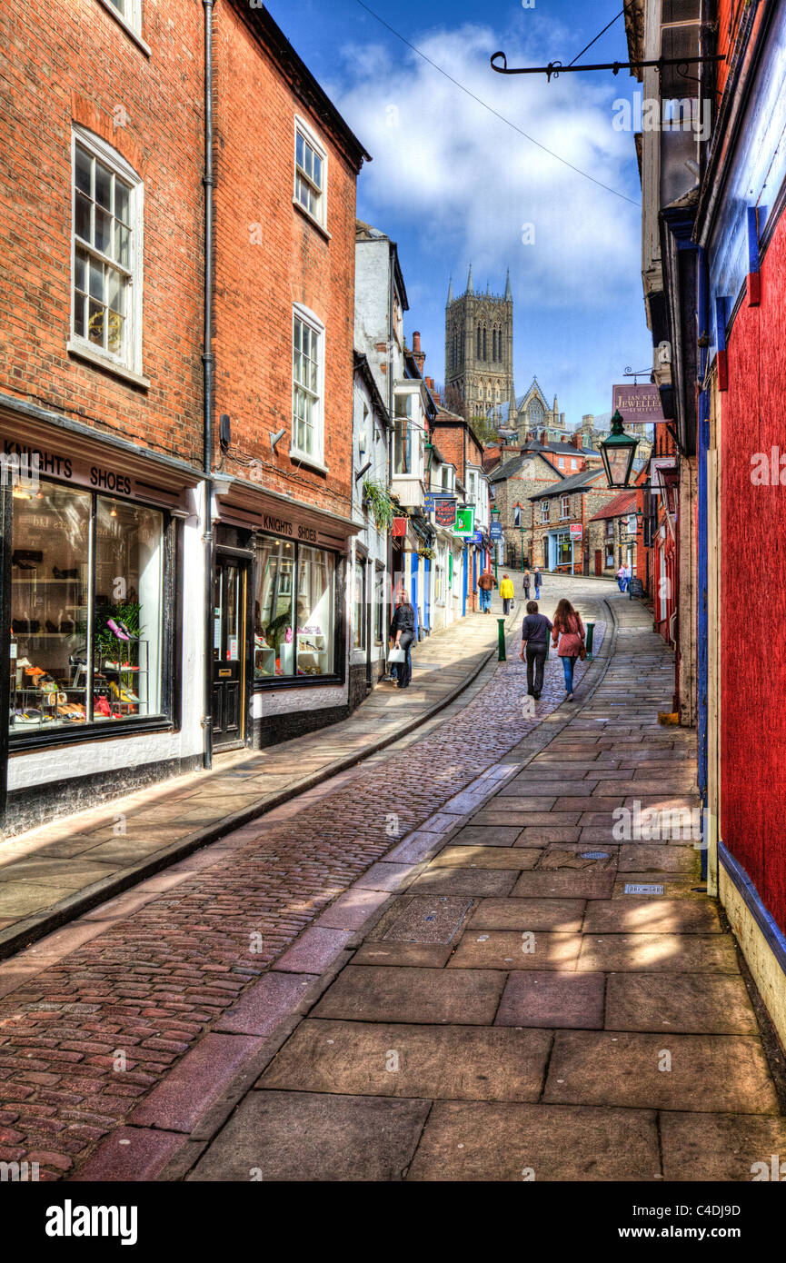 Steep hill in Lincoln, Lincolnshre city capital, cathedral at the top  hdr enhanced image brings out all the colours Stock Photo