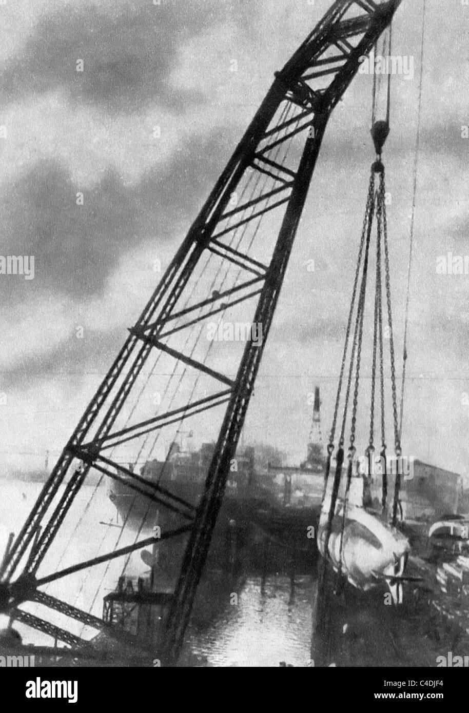 German U boat being hoisted out of the water in a German shipyard during World War I Stock Photo