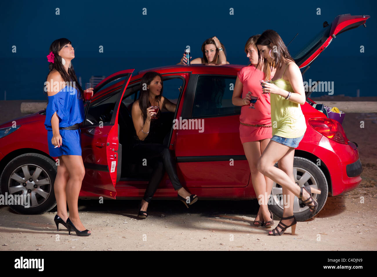 Girls having fun on a warm summer night out Stock Photo Alamy