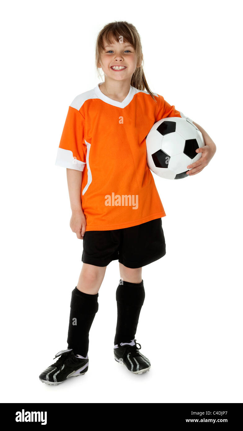 Seven year old girl holding soccer ball on white Stock Photo Alamy