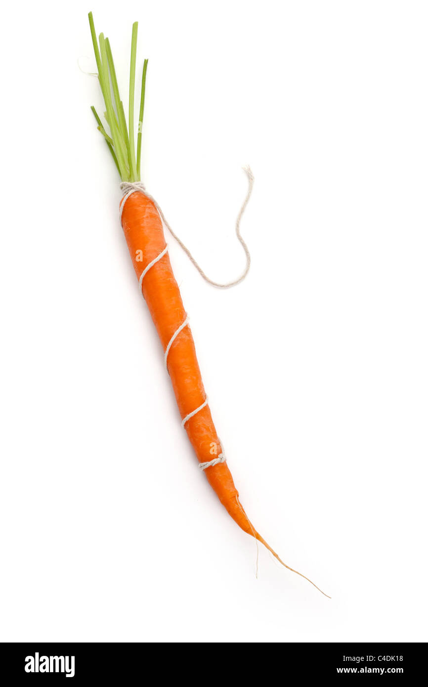 String and carrot with white background Stock Photo