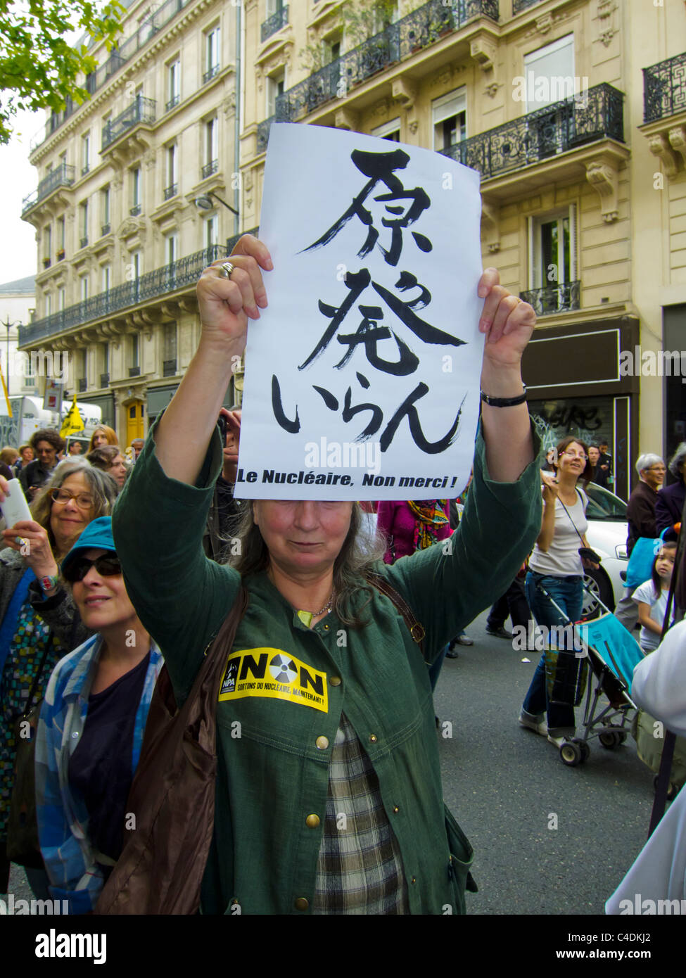 Paris, France, French Demonstration Against Nuclear Power, Woman Holding Japanese Sign, nuclear energy protest Stock Photo
