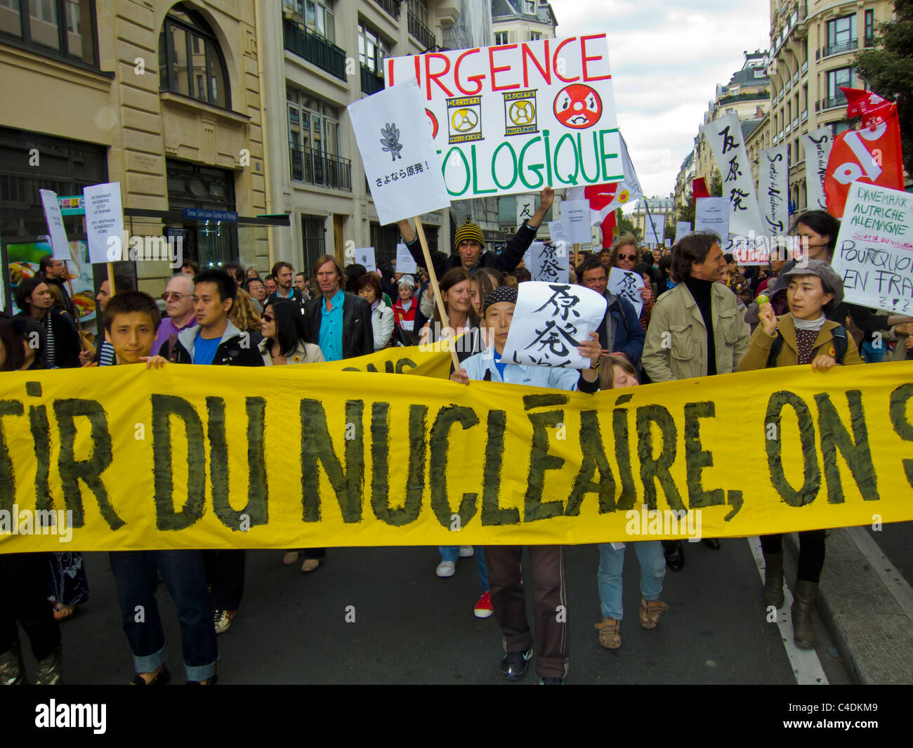 Paris, France, French Demonstration Against Nuclear Power, People Marching with Signs on Street, Environmental Protest, protesters banners Stock Photo