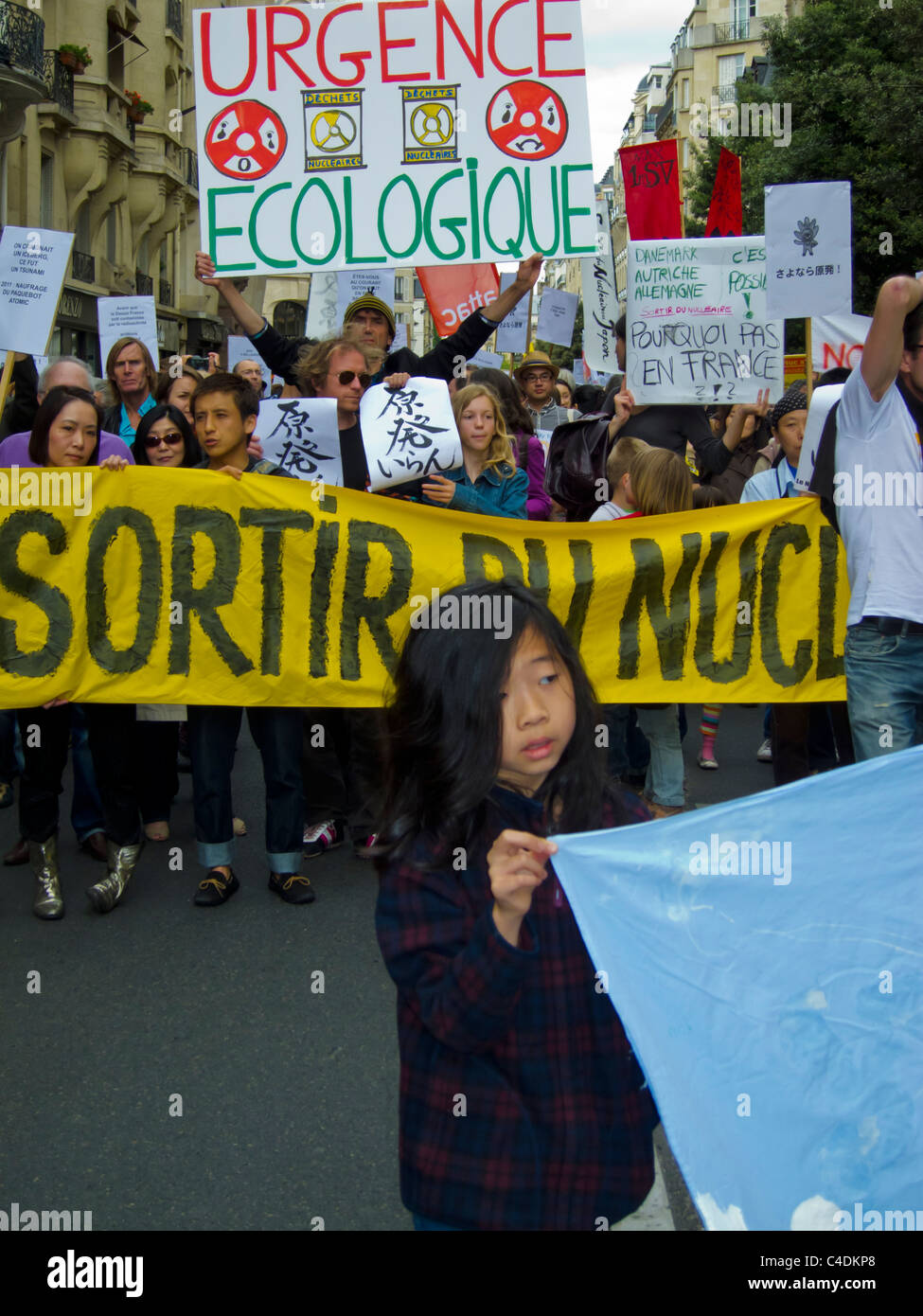 Paris, France, French Demonstration Against Nuclear Power, Young Japanese Child Marching, Signs Stock Photo