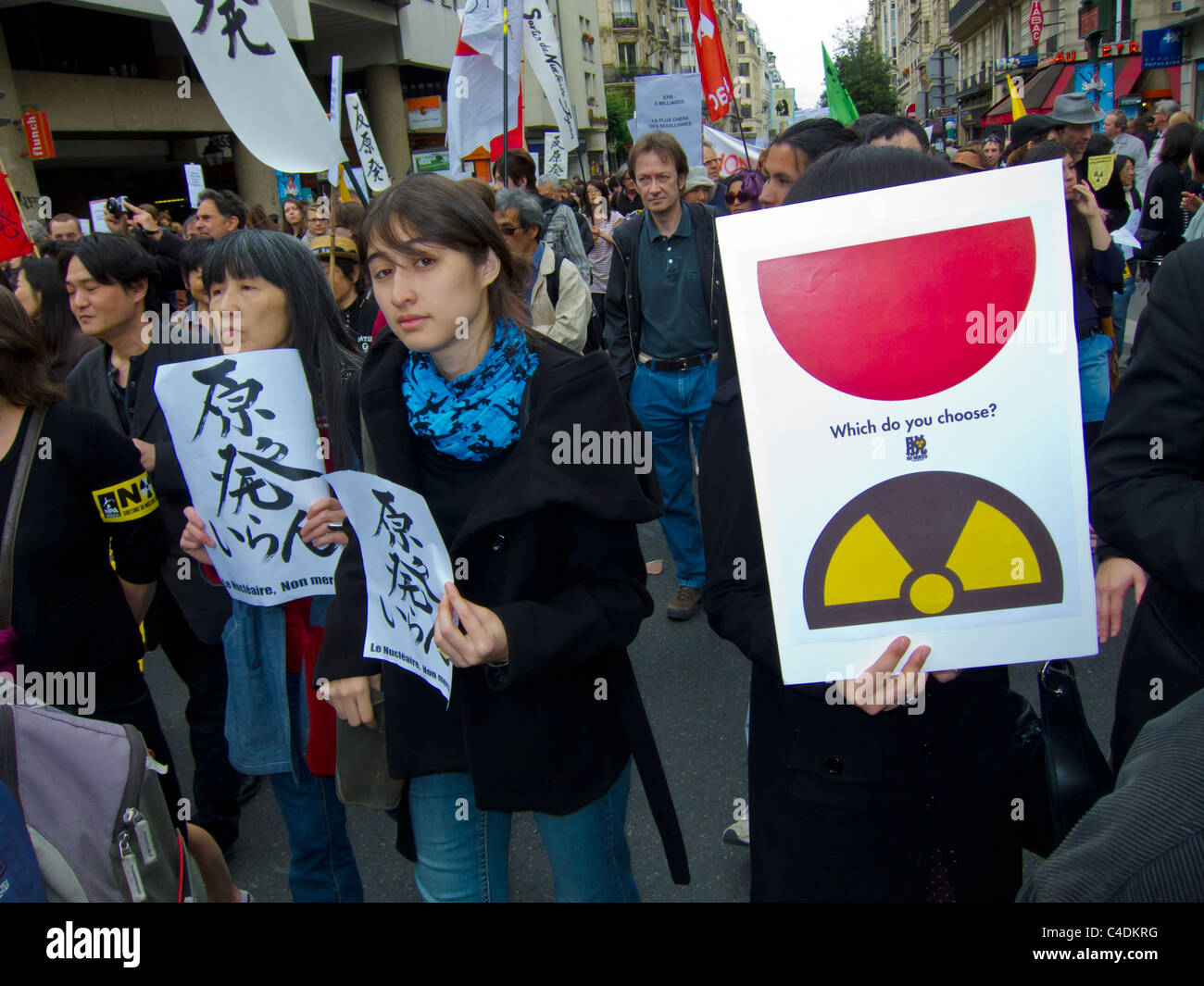 Paris, France, Environmental Demonstration Against Nuclear Power, Japanese Teenagers Marching with Protest Signs Stock Photo