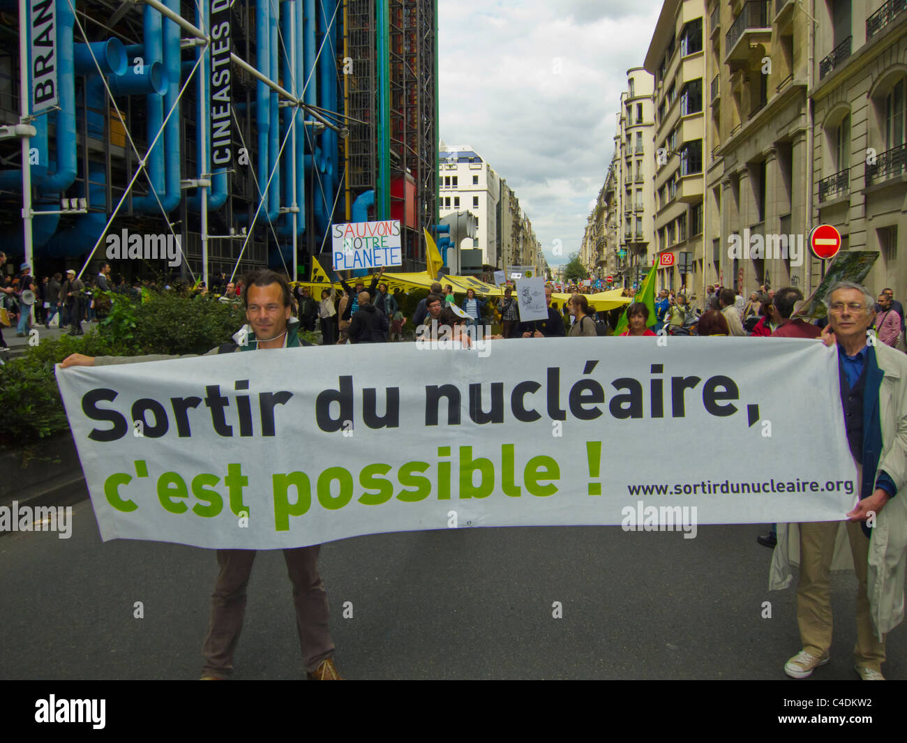 Paris, France, French Demonstration Against Nuclear Power, People Marching with Signs on Street 'Sortir du Nucleare' ('End Nuclear Power') nuclear energy protest Stock Photo