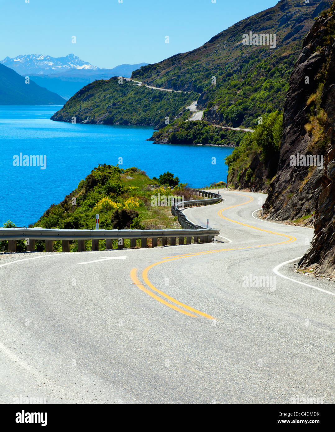Highway along lake coast Stock Photo