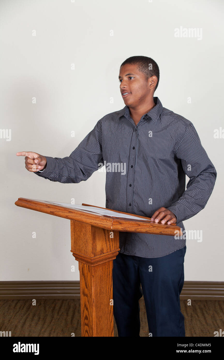 Ethnic minority African-American teen boy speaking to audience. MR © Myrleen Pearson Stock Photo