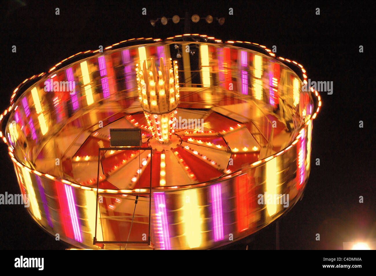 Gravitron Type Carnival Ride Demonstrates Centrifugal Force Stock Photo