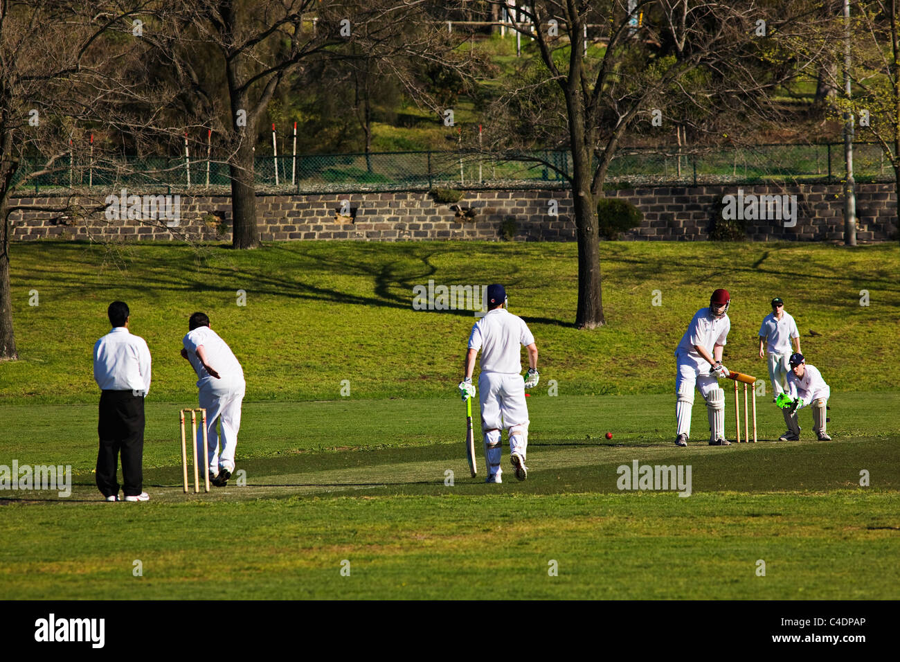 Melbourne Australia  /  An amateur cricket match in progress in Royal Park. Melbourne Victoria Australia. Stock Photo