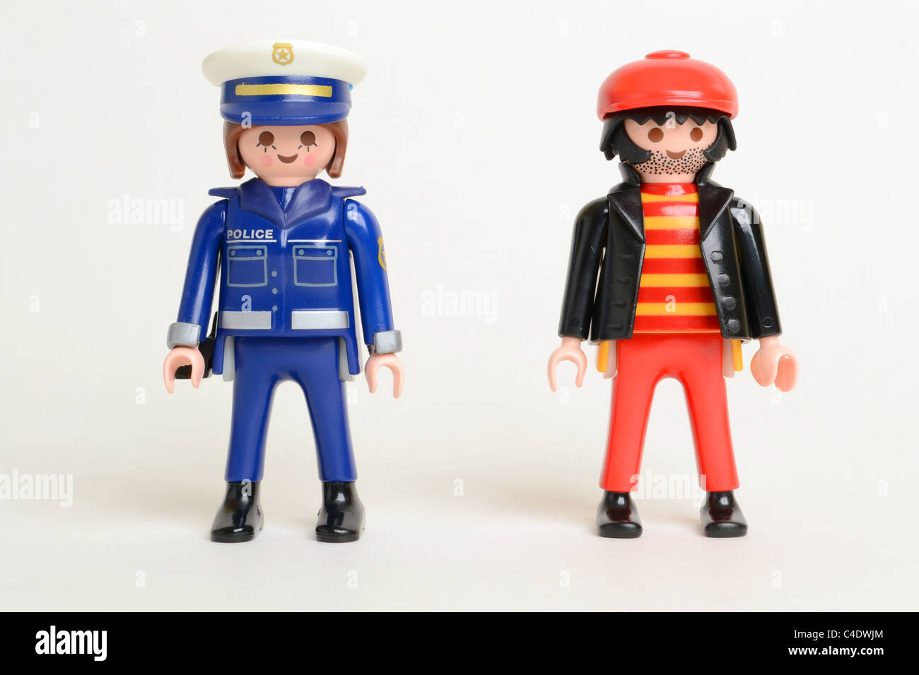 Police thief law crime opposites Police Officer Criminal uniform Playmobil Stock Photo
