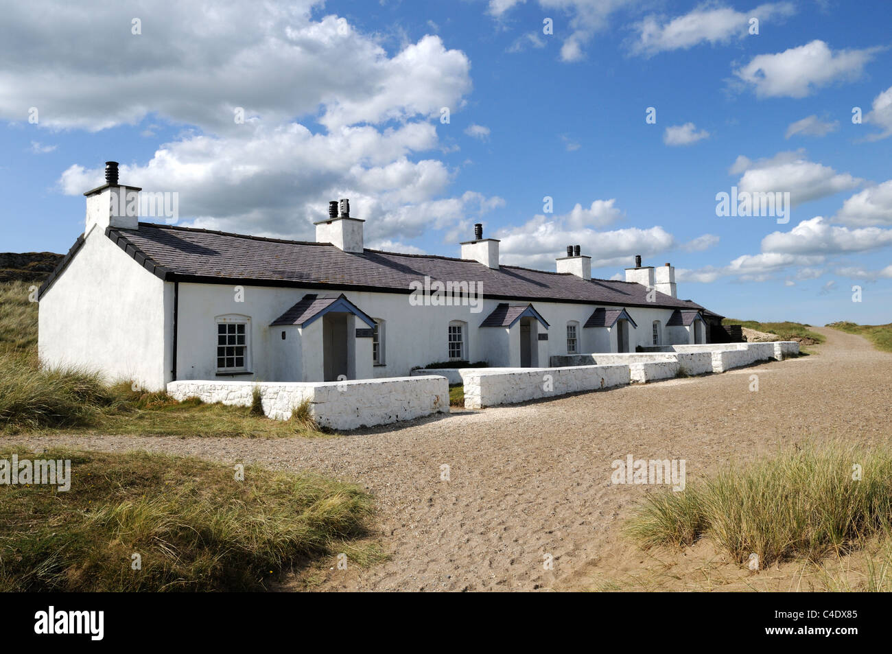 Old Pilot Cottages on Llanddwyn Island Newborough  Anglesey  Sir Fon Gwynedd Wales Cymru UK  GB Stock Photo