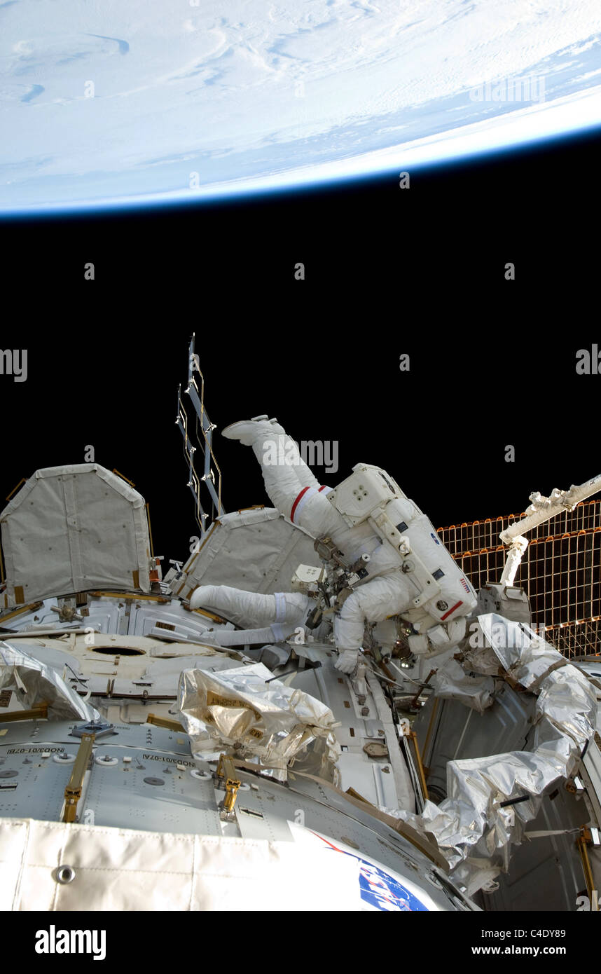 NASA astronaut Steve Bowen works on the International Space Station. Stock Photo