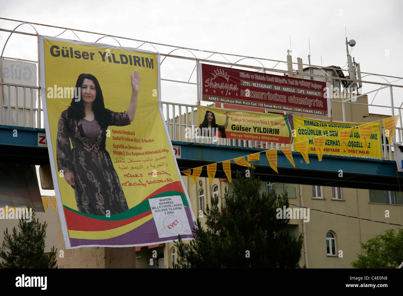Election posters in Turkish, Kurdish, Arabic and Assyrian for independent female candidate