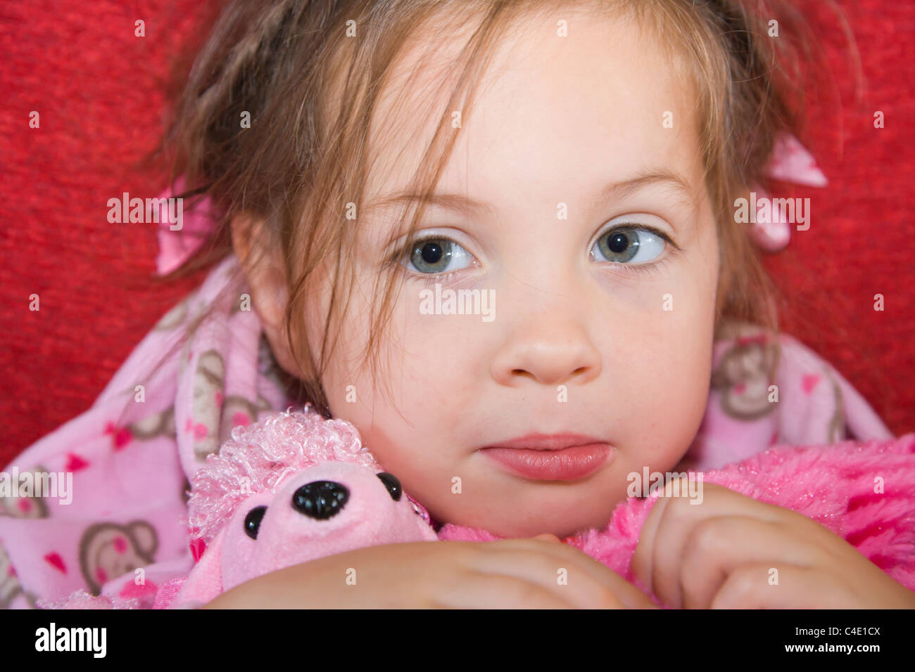4 years old girl in pink pyjama Stock Photo