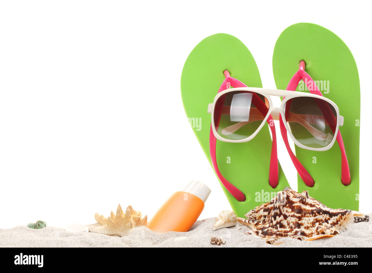 summer holidays memories from beach with shells and sunglasses on sand Stock Photo