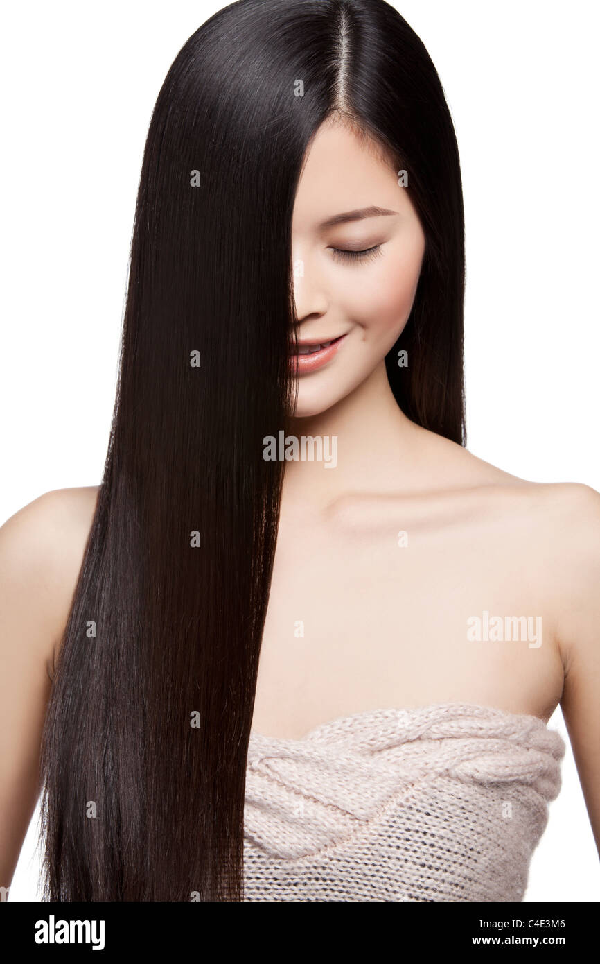 Young Woman With Long Silky Hair Stock Photo - Alamy