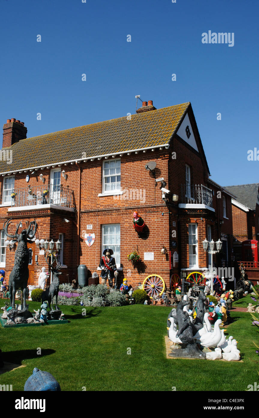 A house with lots of statues in the garden in Clacton Essex Stock Photo