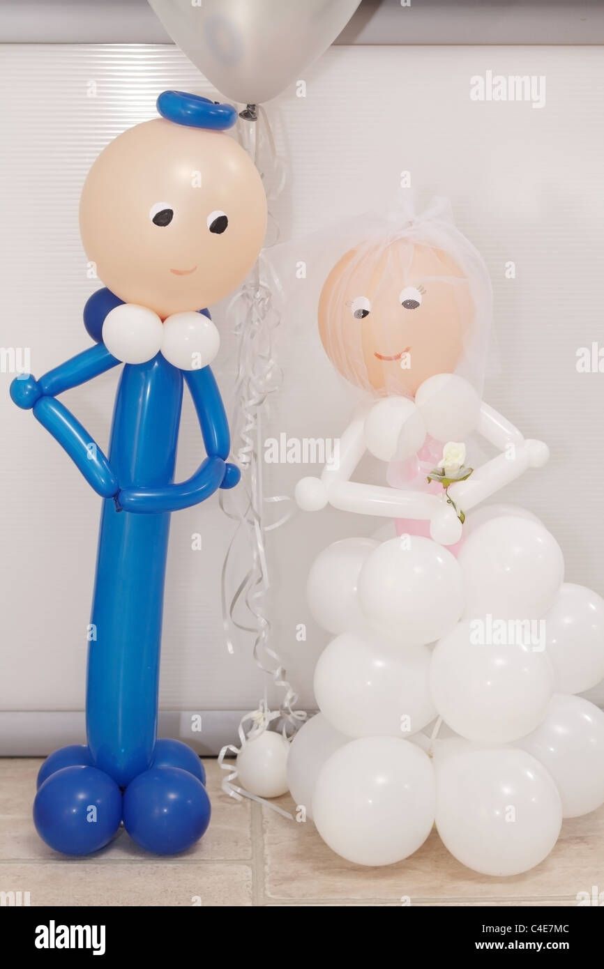 Helium Inflated Balloons In Form Of Bride And Groom Stock Photo