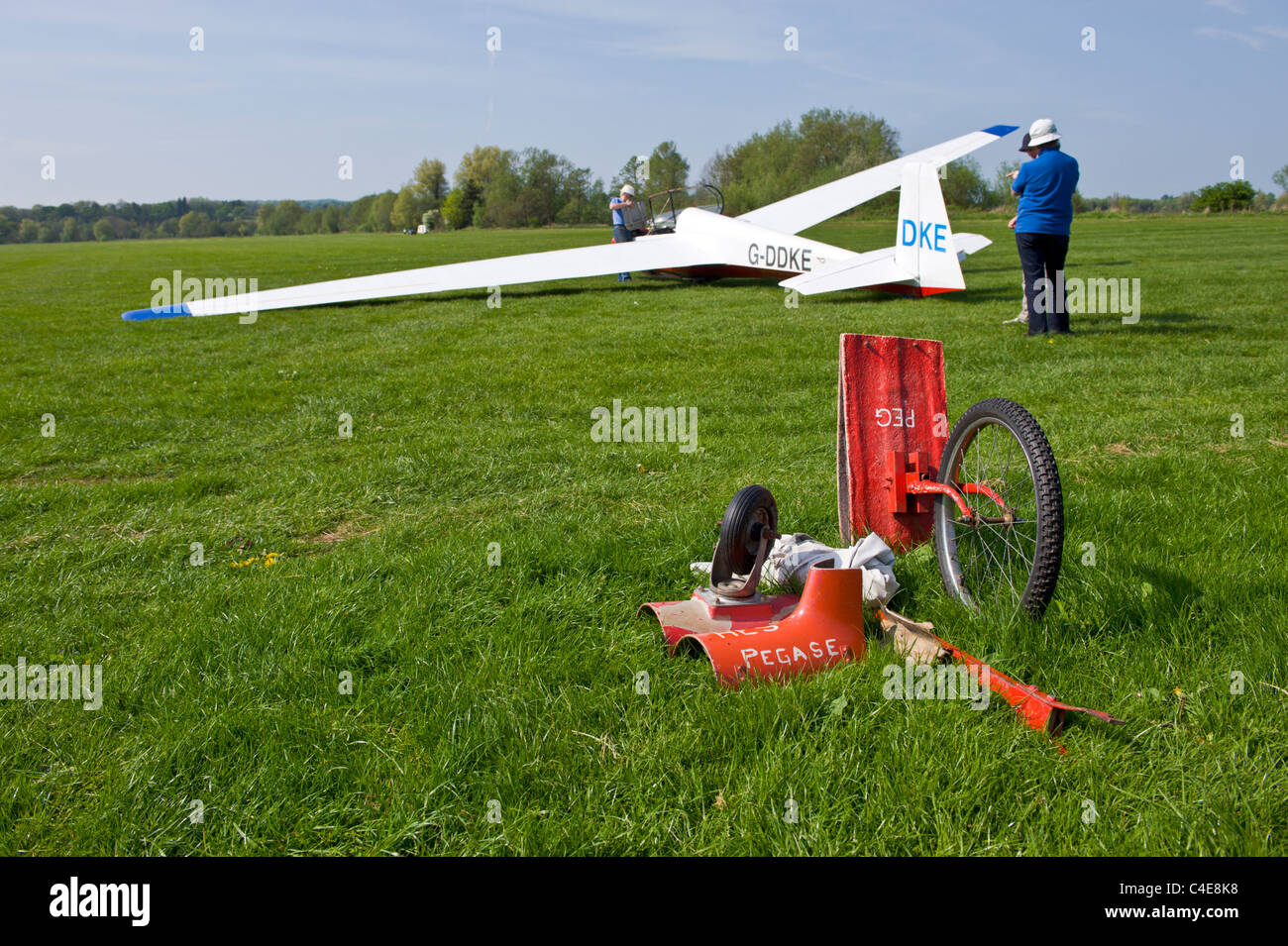 Glider aircraft being prepared for flight on airfield Stock Photo