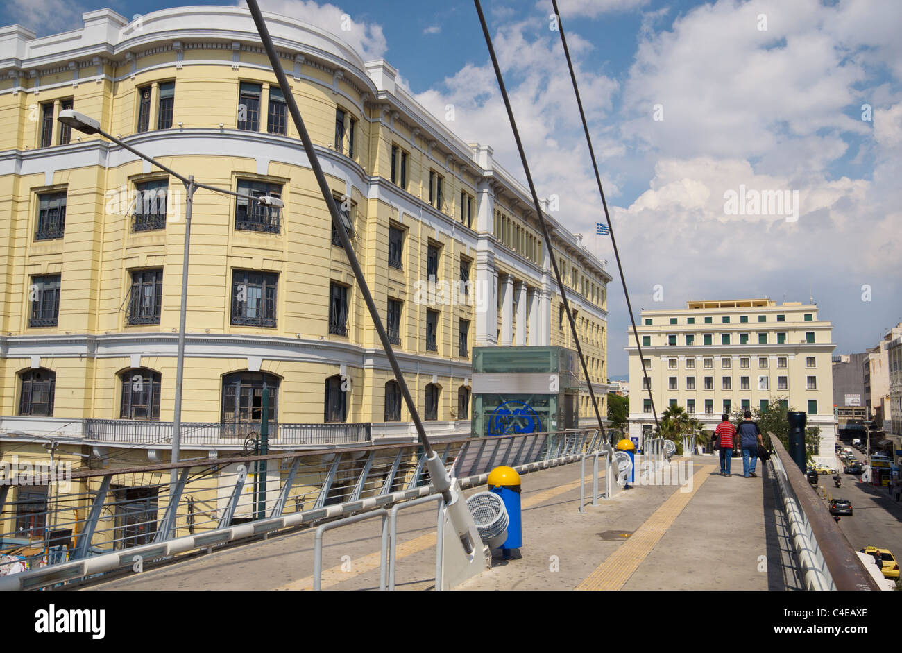 Pedestrian bridge linking the port with the metro station at Piraeus, Athens, Greece Stock Photo