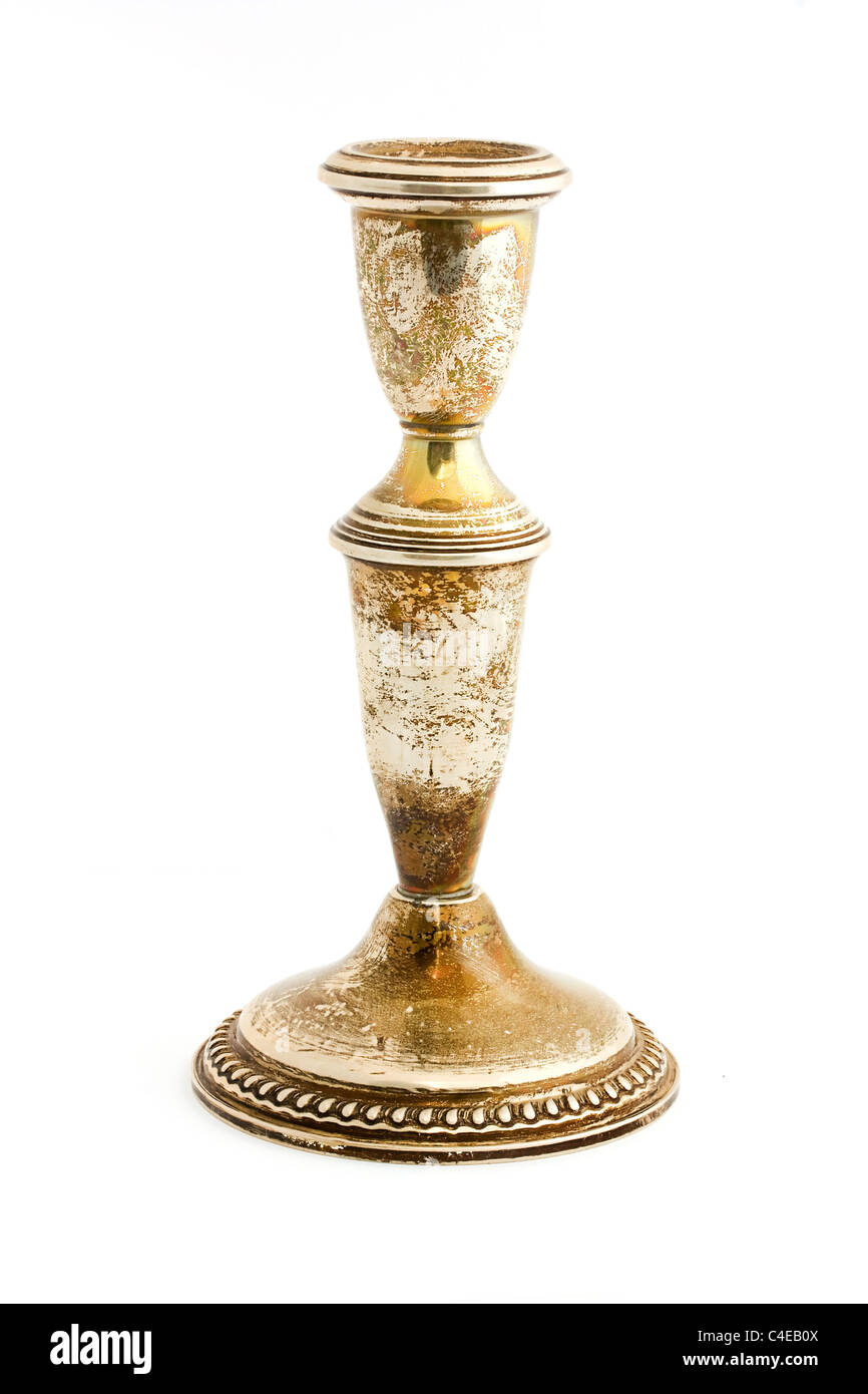 Old tarnished candlestick holder isolated on white Stock Photo