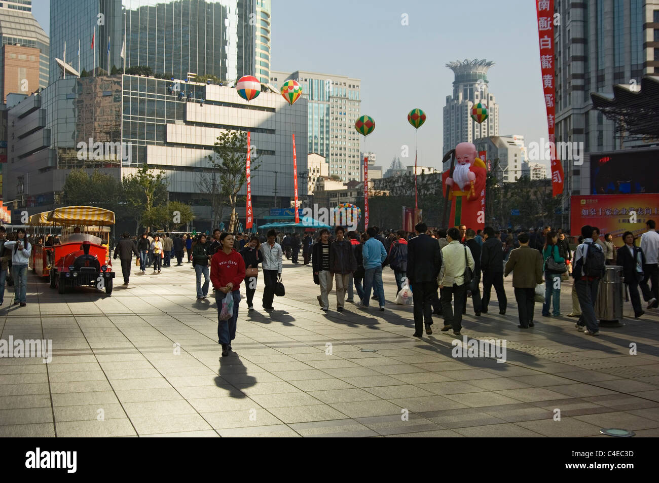 Pedestrians on Nanjing Road, the premier shopping street of modern Shanghai, China. Stock Photo