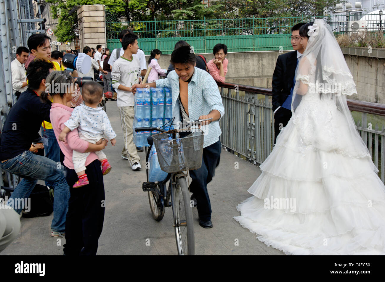 Wedding photographs on Waibaidu Bridge (a popular spot), Shanghai. Stock Photo