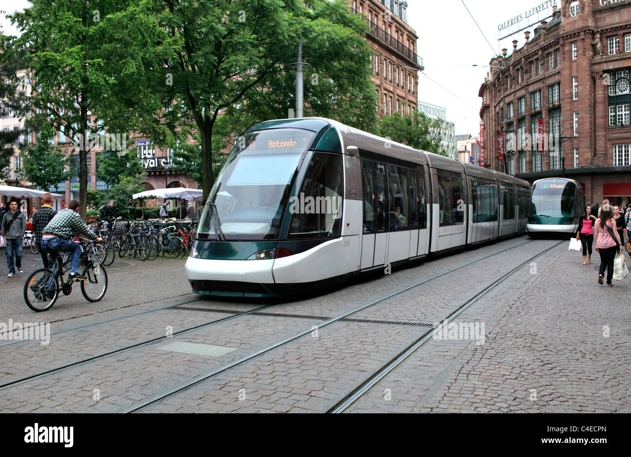 Modern tram on the Rue des Francs-Bourgeois in the centre of Strasbourg, France. Background: part of the Place Kleber. Stock Photo