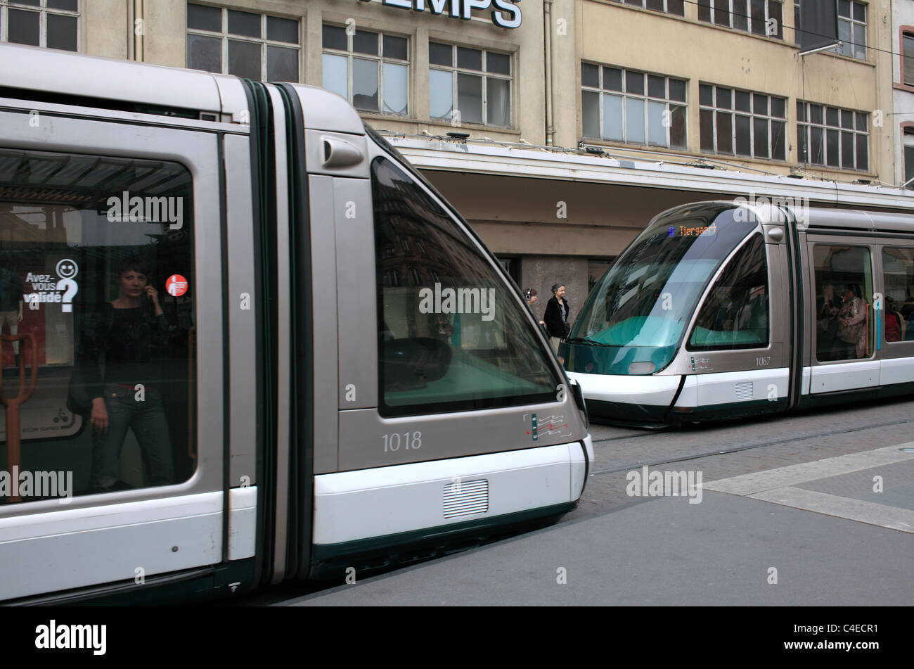 Trams passing on the Rue de la Haute Montee in the centre of Strasbourg, France. Stock Photo
