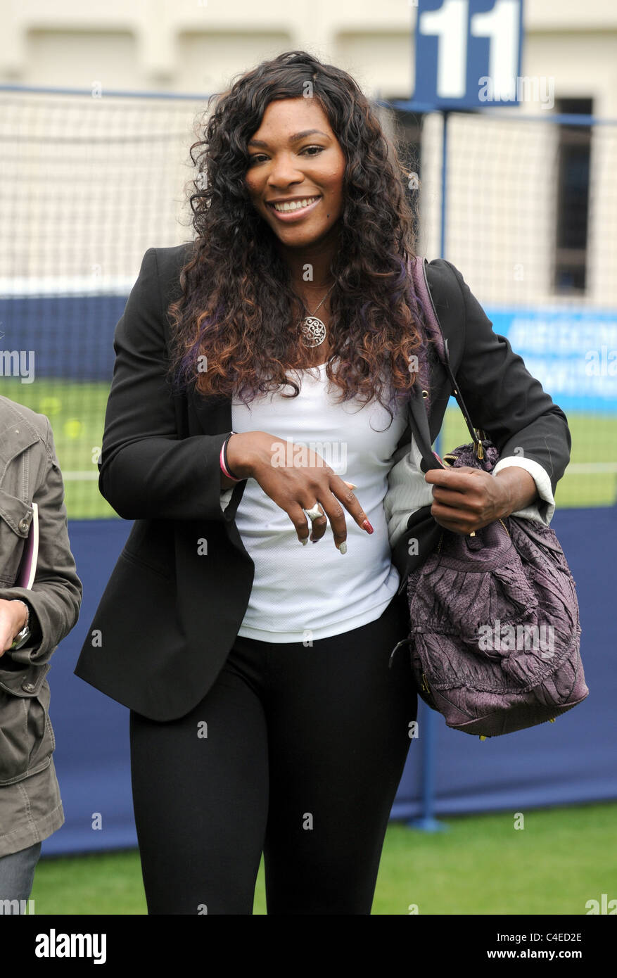 Serena Williams looking relaxed surrounded by the media at the Aegon International tennis tournament at Eastbourne Stock Photo