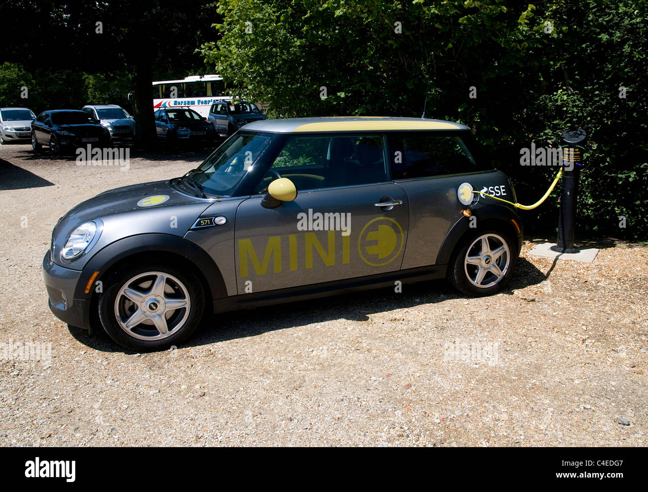 2011 Mini E Electric car at battery charging point Stock Photo