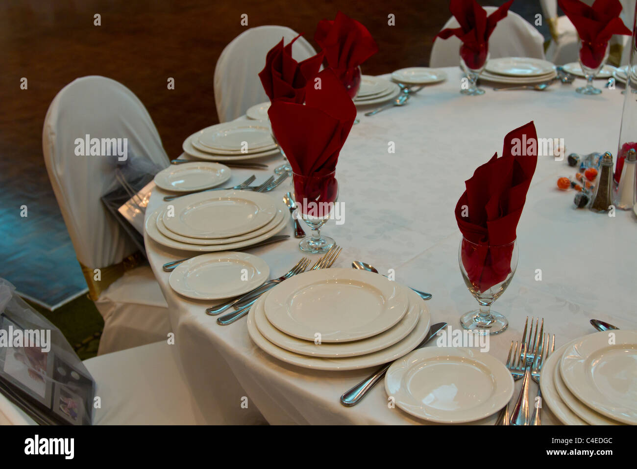 table set plates folk knife white banquet dinner Stock Photo