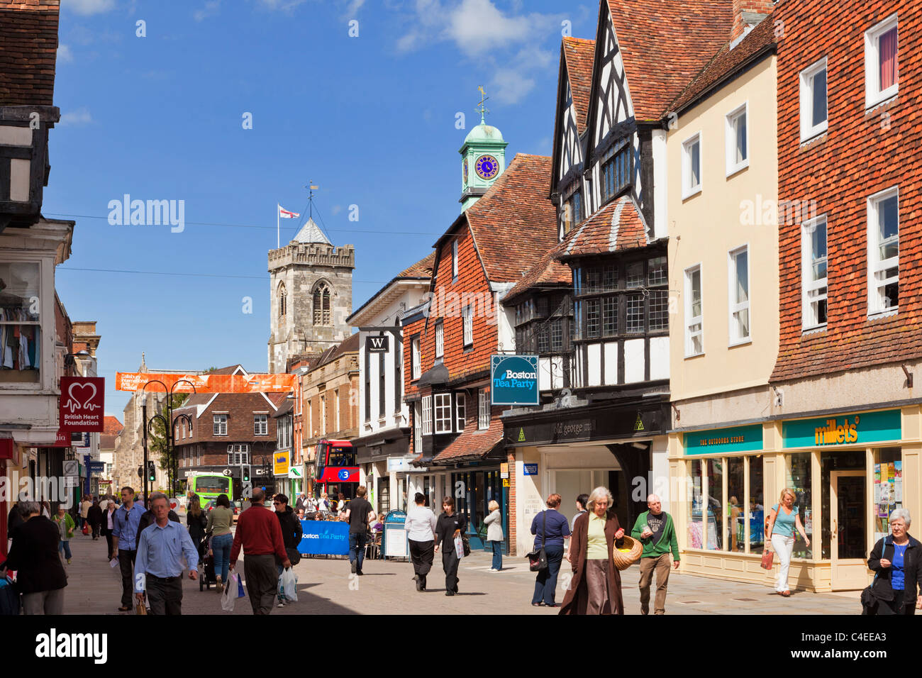 Shoppers shopping in the High Street uk in the old town of Salisbury, Wiltshire, England, UK Stock Photo