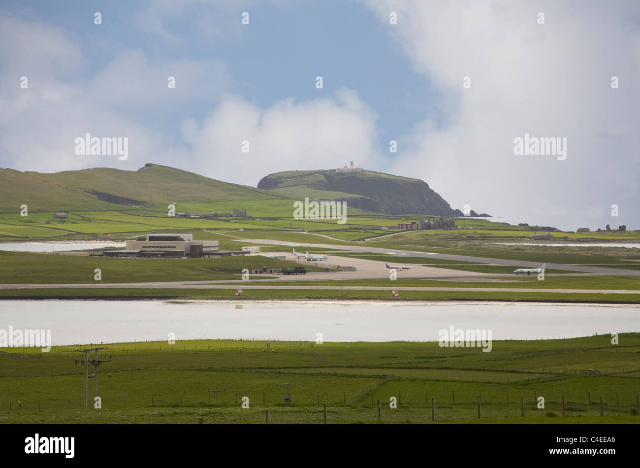 Sumburgh Shetland Islands Scotland Located in the South this is the main airport of the Shetlands with parked planes and long flat area for  runway Stock Photo