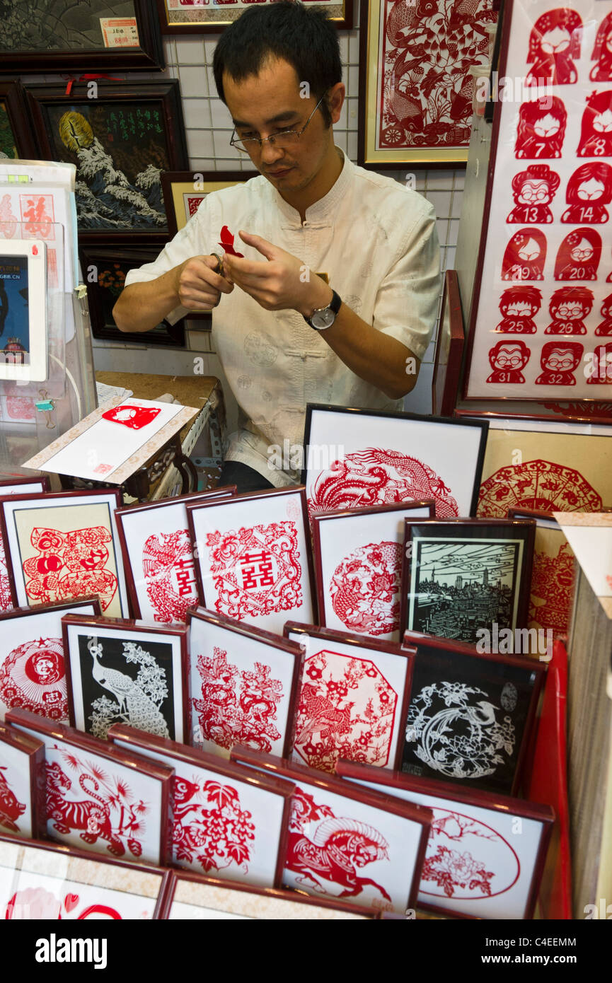 Shop selling Chinese papercuts, at Chenghuangmiao market. Shanghai, China Stock Photo
