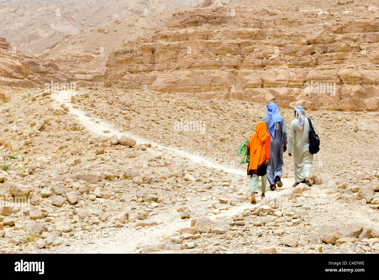 Bedouins walking - Wadi Arada canyon - Sinai Peninsula, Egypt Stock Photo