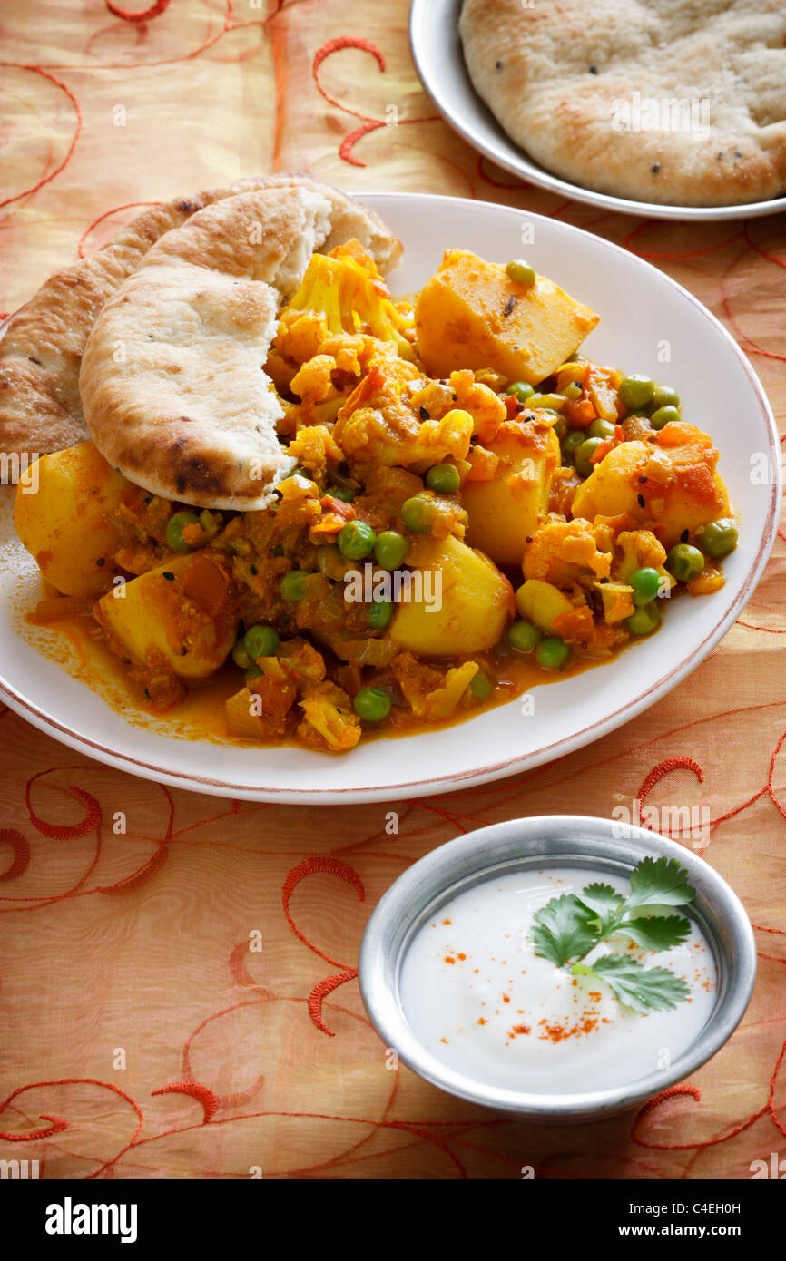 Indian vegetarian curry made from cauliflower, potatoes and peas