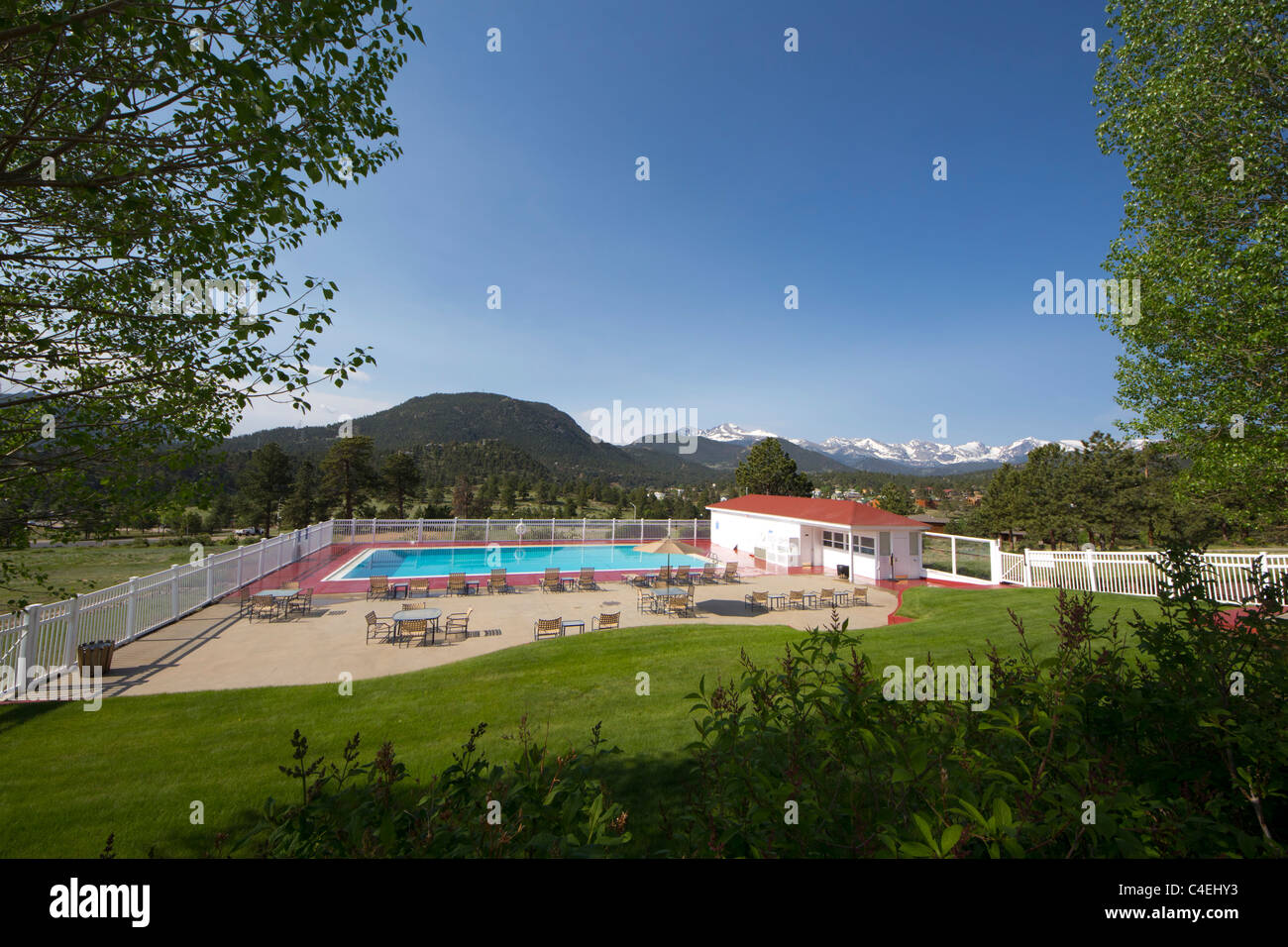 The swimming pool at the Stanley Hotel in Estes Park, Colorado provides for spectacular views of the Rocky Mountains Stock Photo