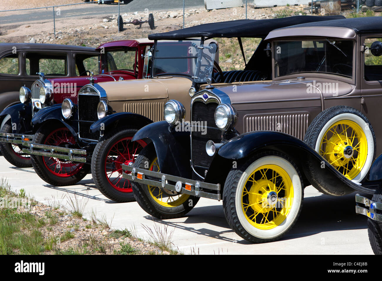Estes Park, Colorado - A row of Model A Ford automobiles produced between 1927 and 1931 line a parking lot. Stock Photo