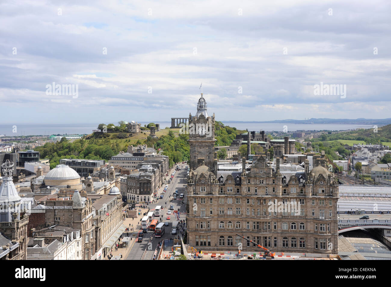 The Balmoral Hotel, Princes Street, Edinburgh, Scotland. In the distance is Calton Hill and the Firth of Forth on the horizon Stock Photo