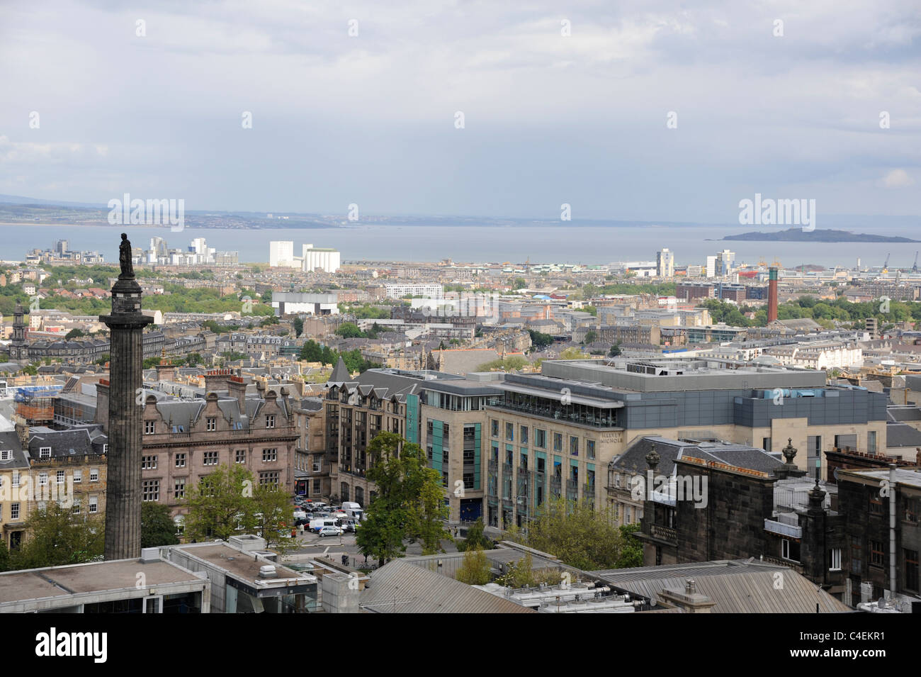 Edinburgh New Town with Henry Dundas Statue and Harvey Nichols on St Andrew's Square and a view north to the Firth of Forth Stock Photo