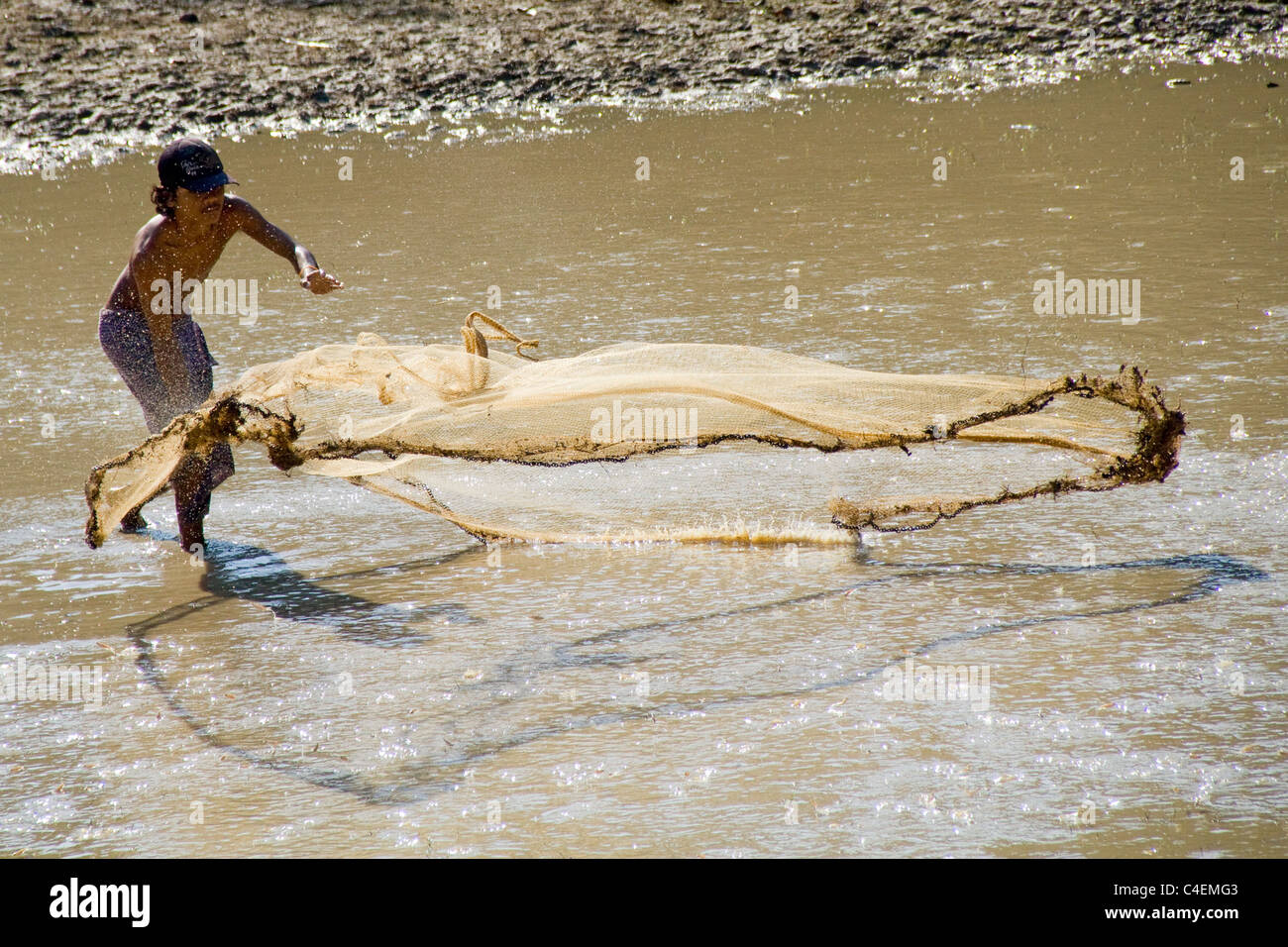 Cambodian man fishing with traditional throw net.Siem Reap, Cambodia Stock  Photo - Alamy