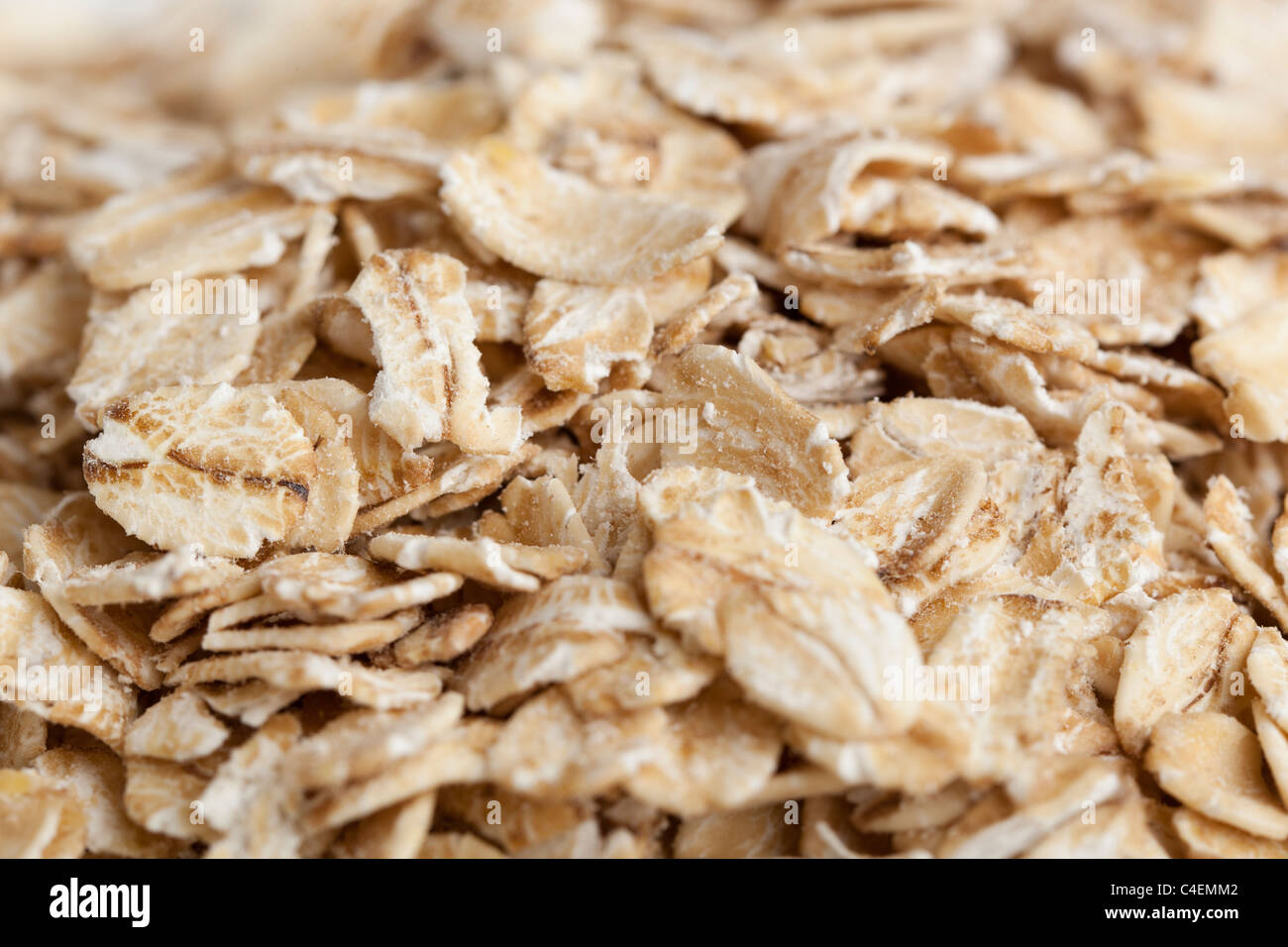 Dry oatmeal against a white background Stock Photo