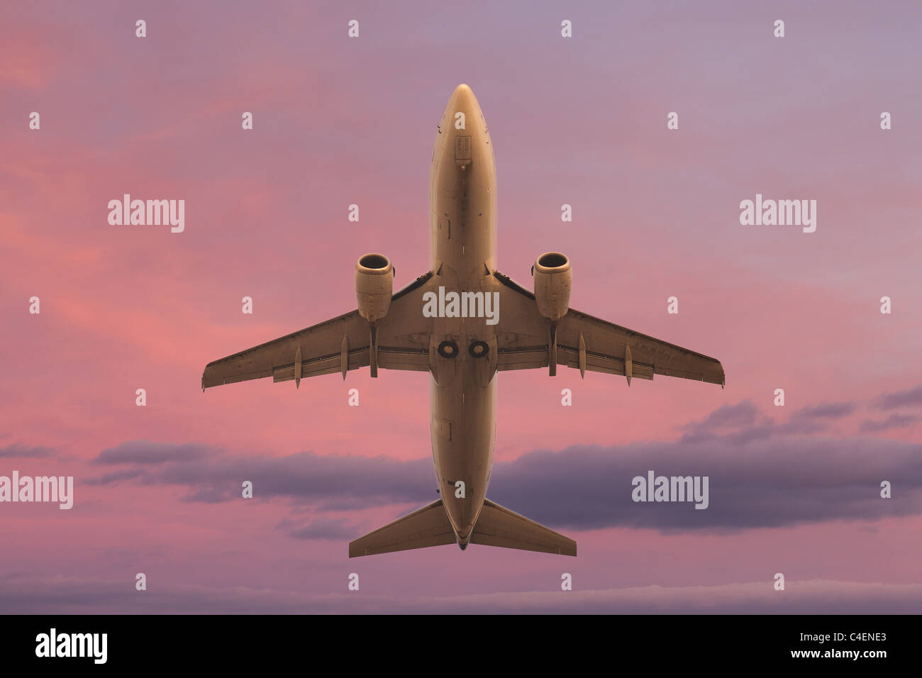 flying-aircraft-at-sunset-stock-photo-alamy