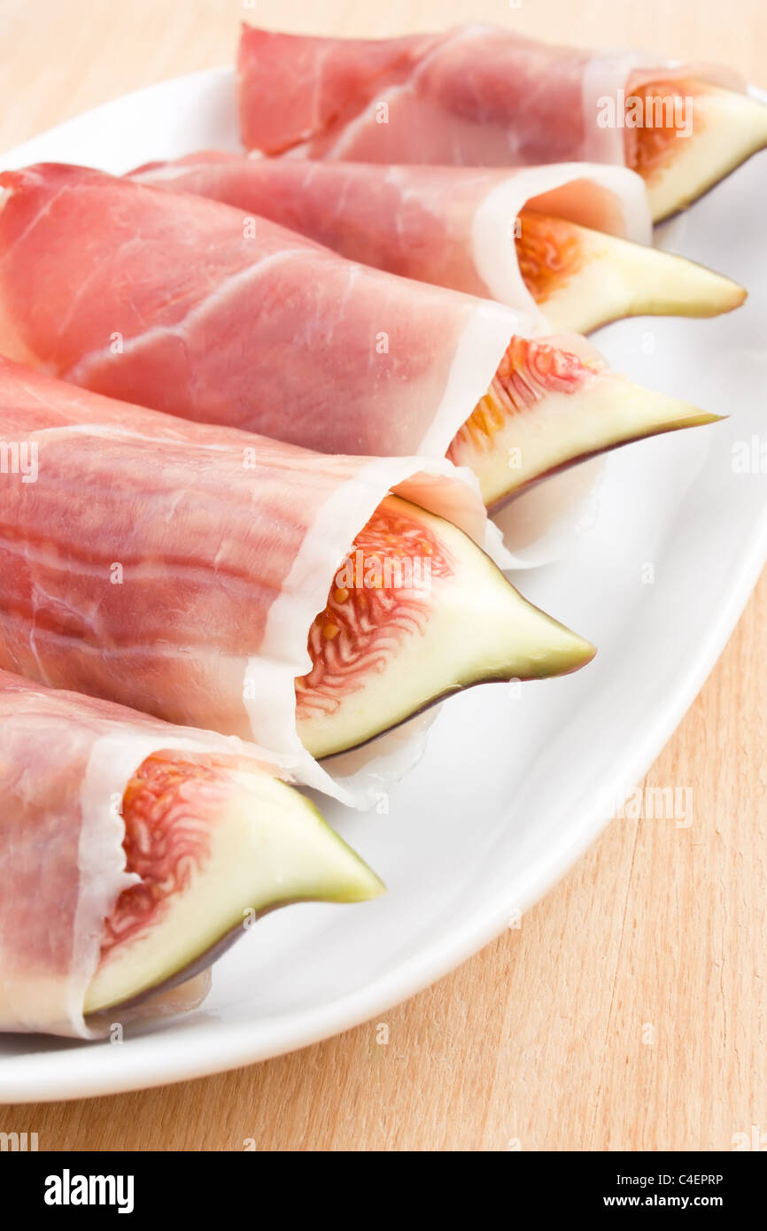 Figs in Prosciutto Italian cured ham Stock Photo Alamy