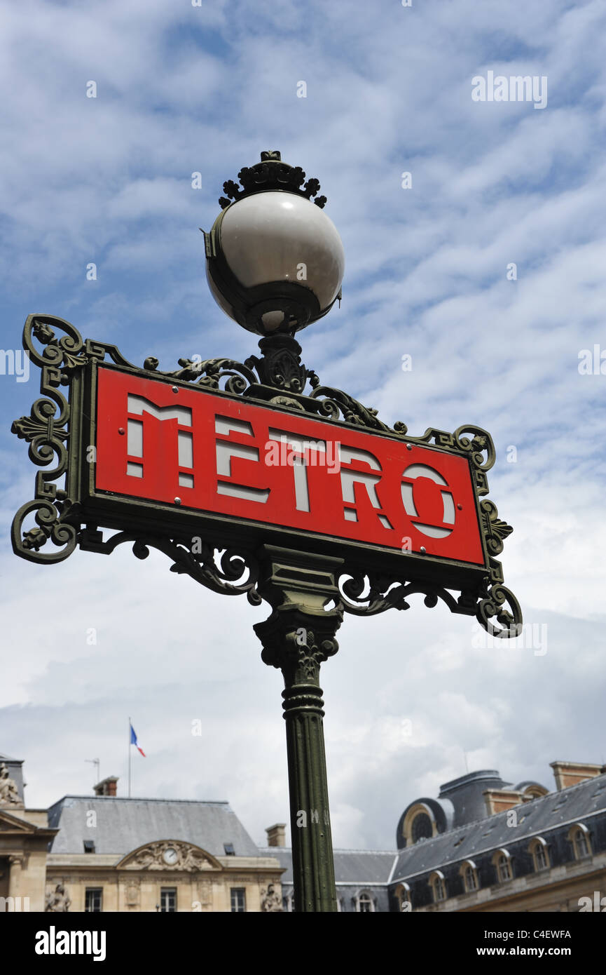 Paris Metro sign the station Palais-Royal – a 1909 Val d′Osne candelabria, they are recognizable by the elaborate ironwork edging Stock Photo