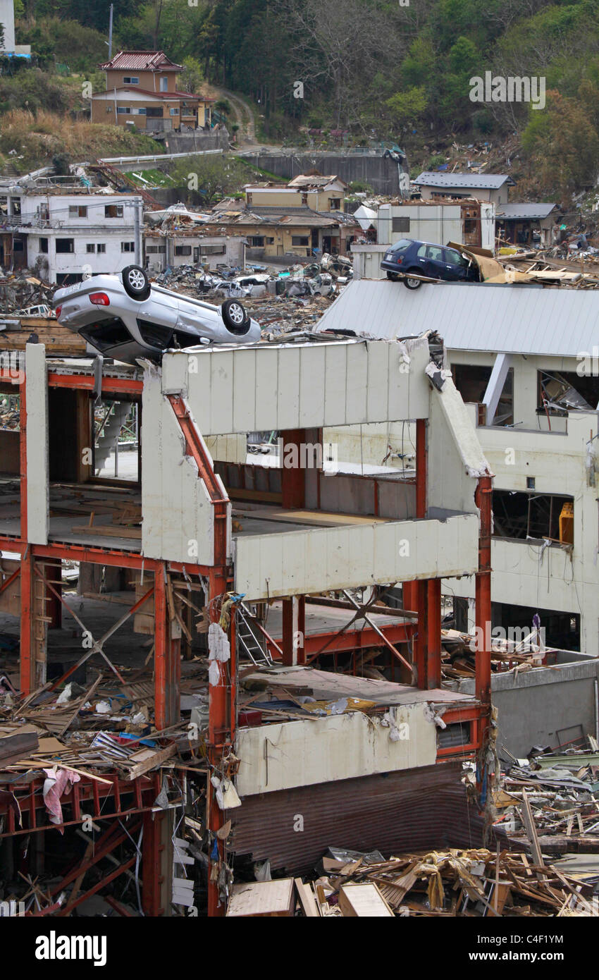 cars left on top of a buildings after tsunami wave gone Onagawa town Miyagi Japan Stock Photo