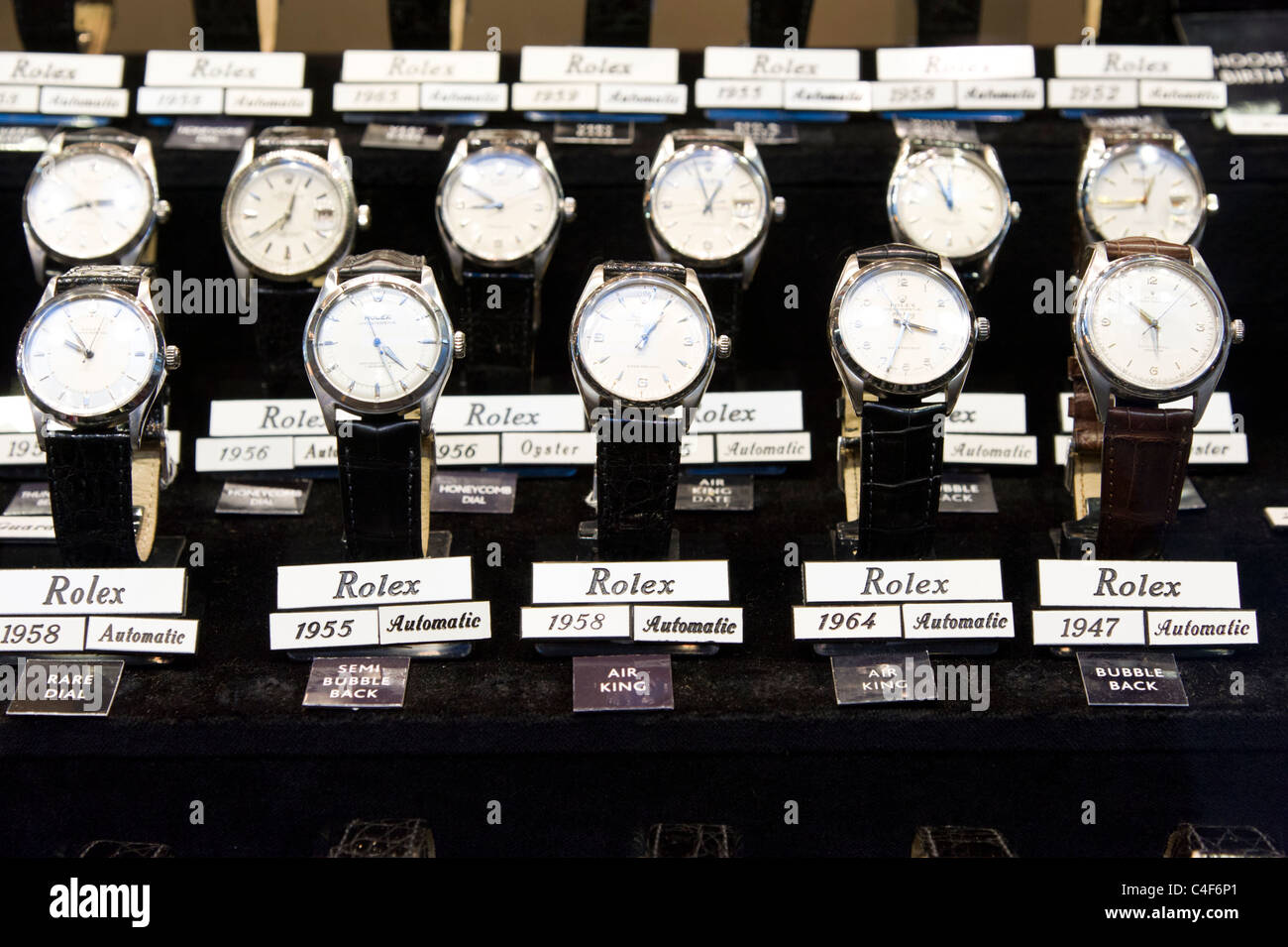Vintage Rolex watches in shop window, London, UK Stock Photo
